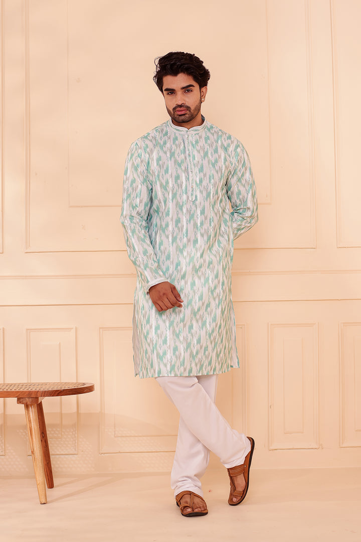 Green Soft Silk Ikat Print Kurta Suit.
