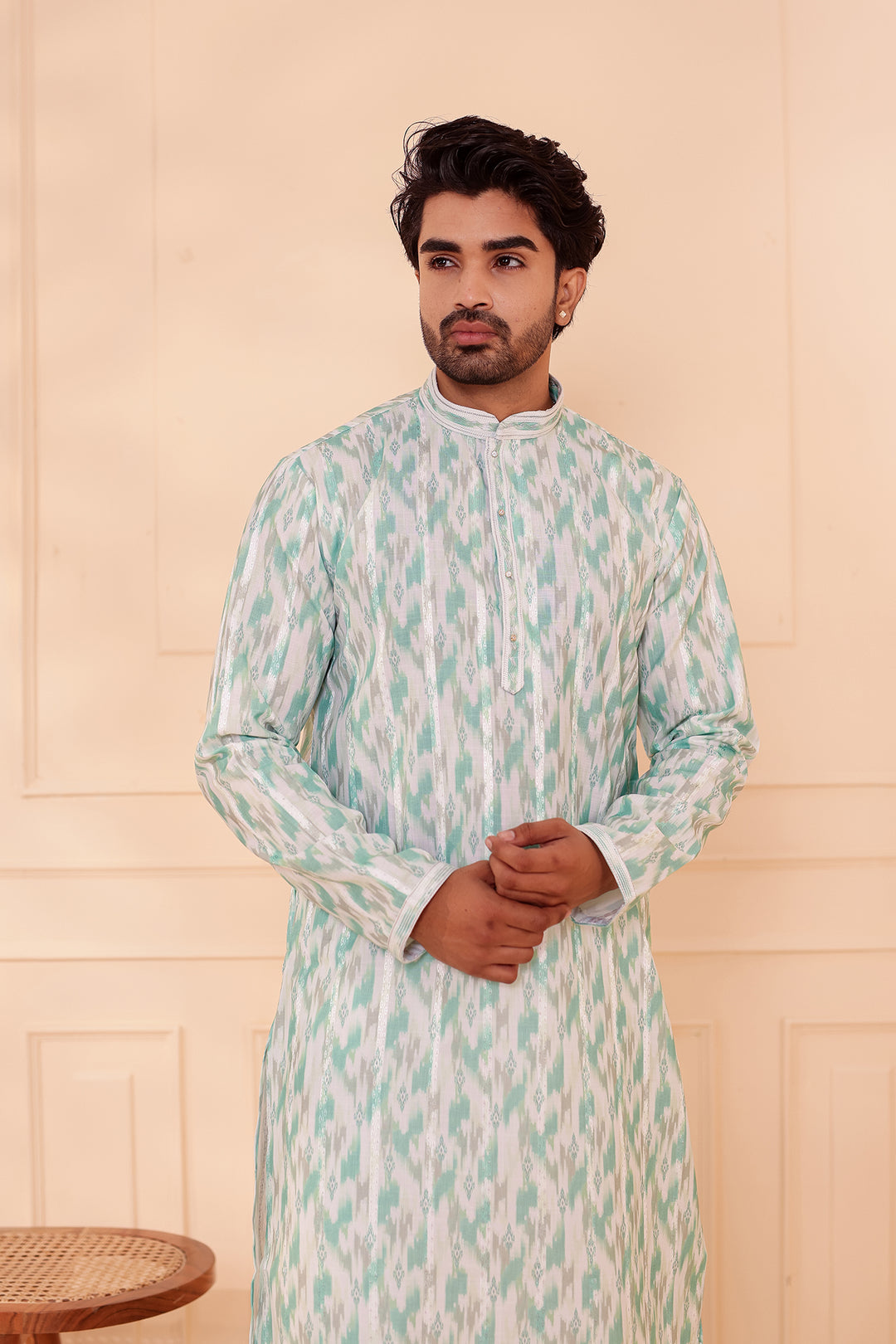Green Soft Silk Ikat Print Kurta Suit.