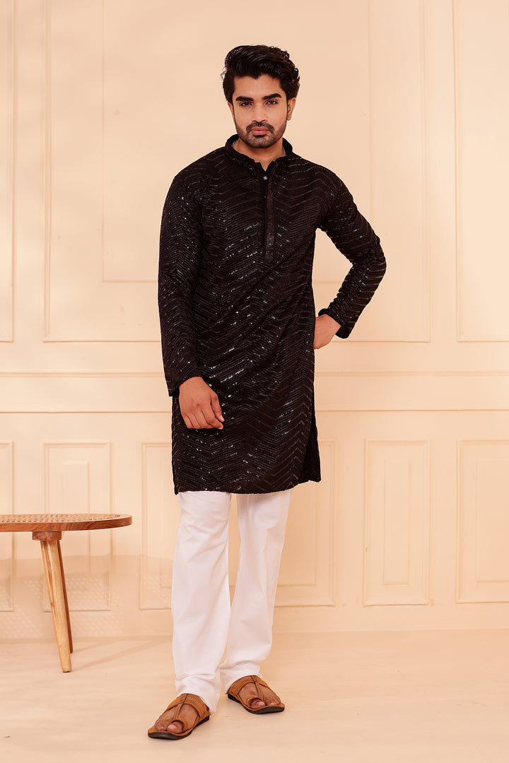 Black Soft Georgette Kurta Suit with Self Thread and Sequin work all over.