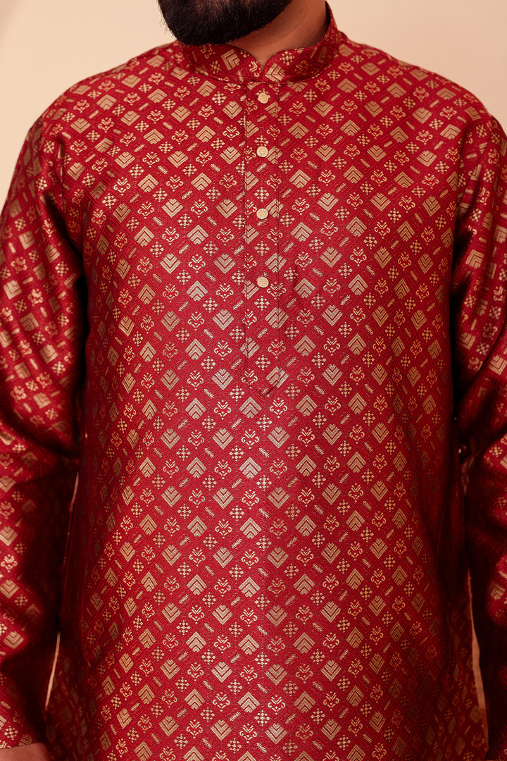 Maroon Brocade Silk Kurta Suit with Gold Zari Weave.