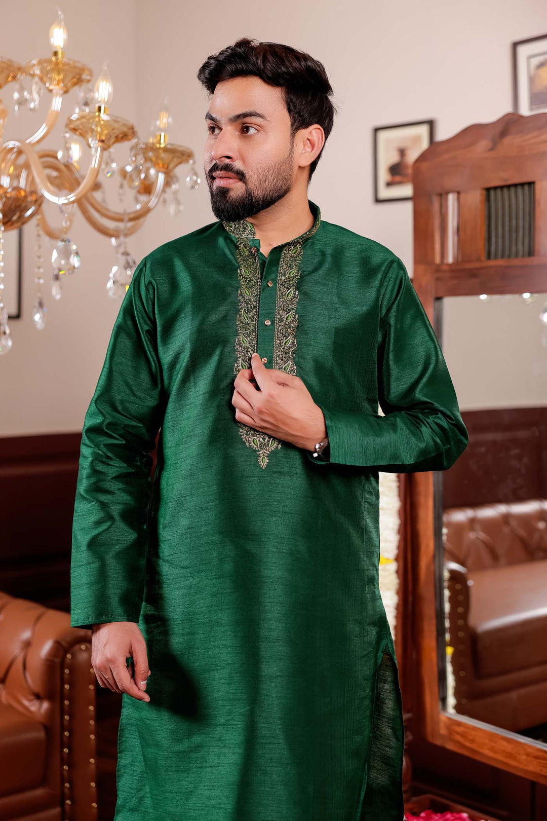 Bottle Green Raw Silk Kurta Suit with Intricate Embroidery on neckline.
