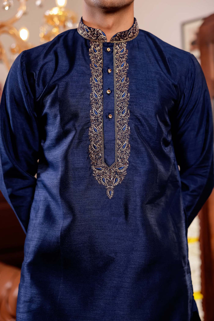 Navy Blue Raw Silk Kurta Suit with Intricate Embroidery.