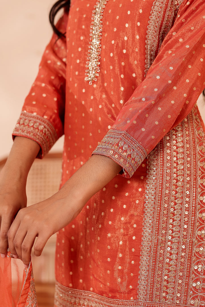 Rust Shimer Butti Sharara Suit.