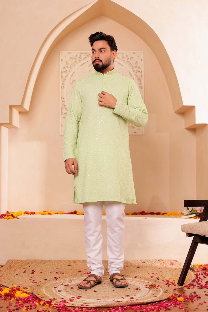 Mint Green Chikankari Embroidered Kurta Suit.