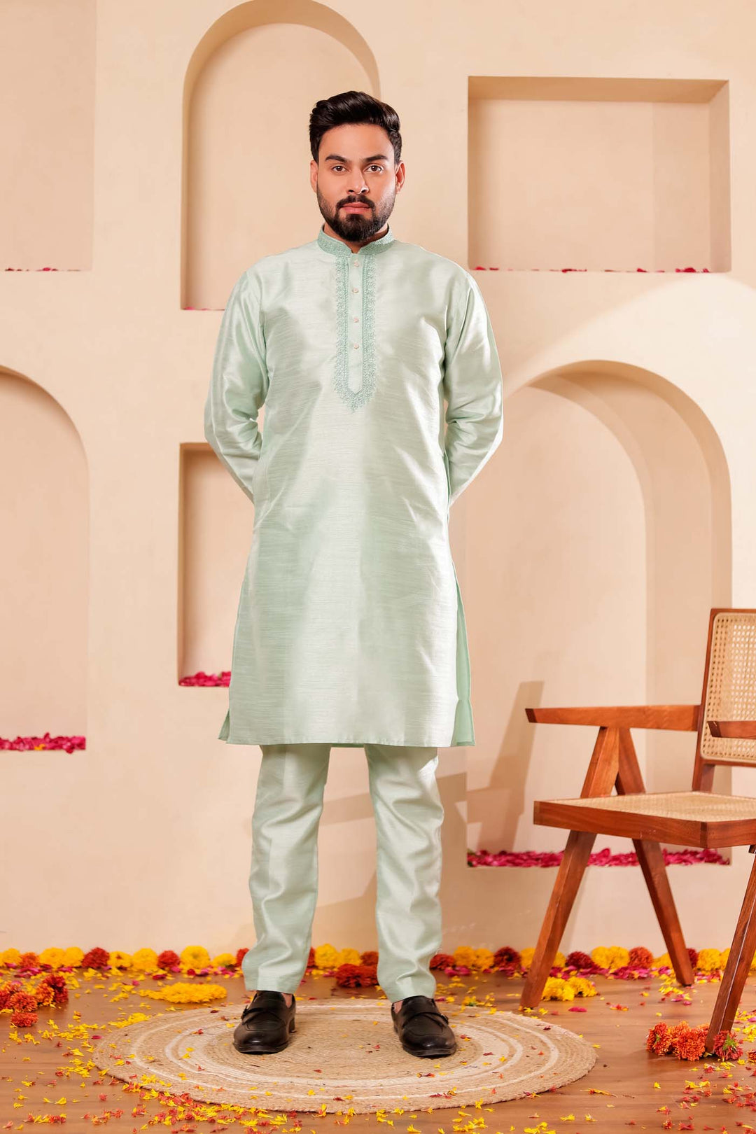 Pista green Raw Silk Kurta Suit with Intricate work on neckline.