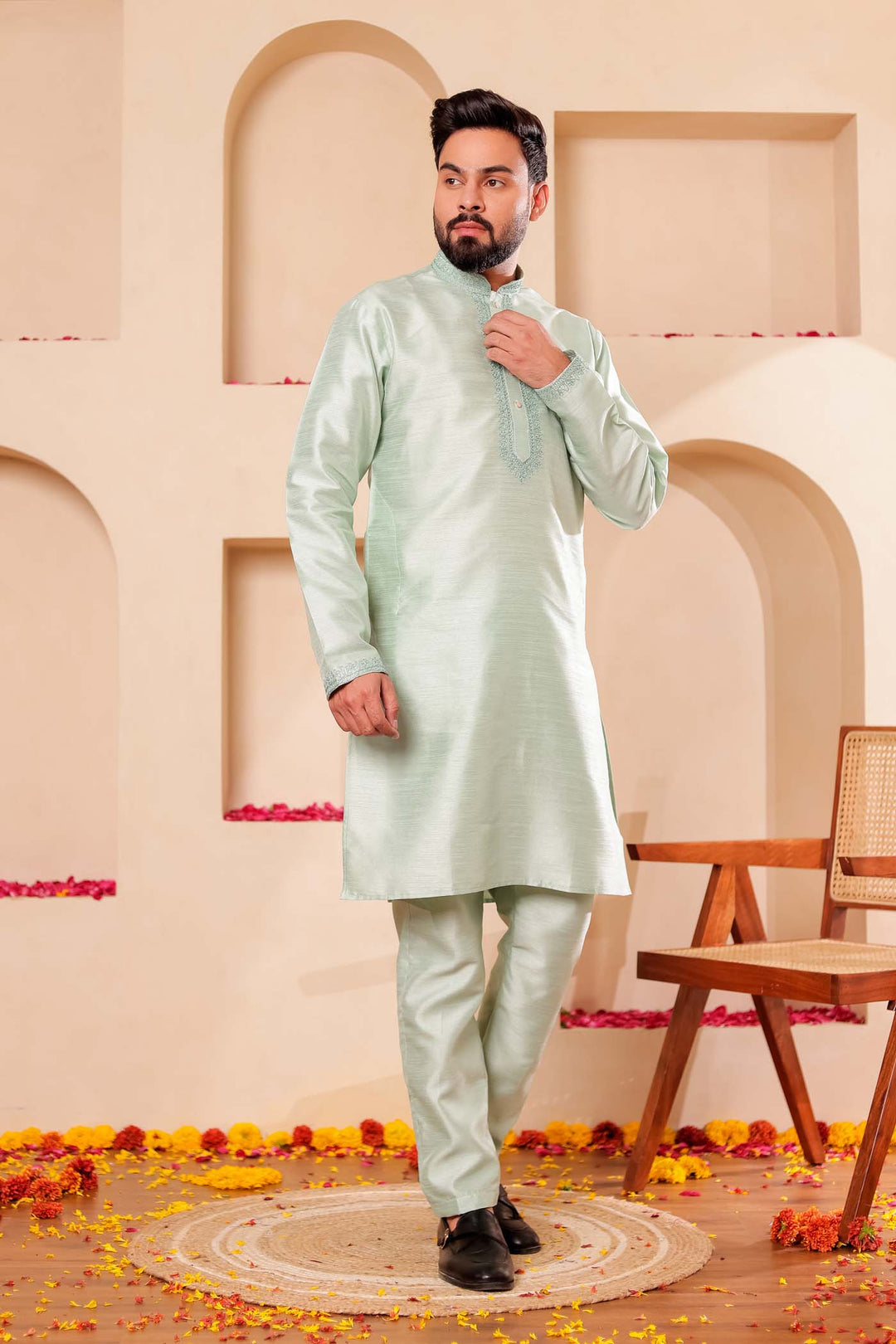 Pista green Raw Silk Kurta Suit with Intricate work on neckline.