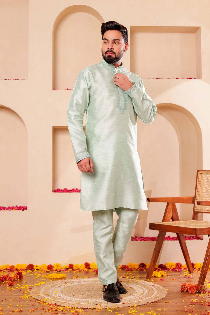 Pista green Raw Silk Kurta Suit with Intricate work on neckline.