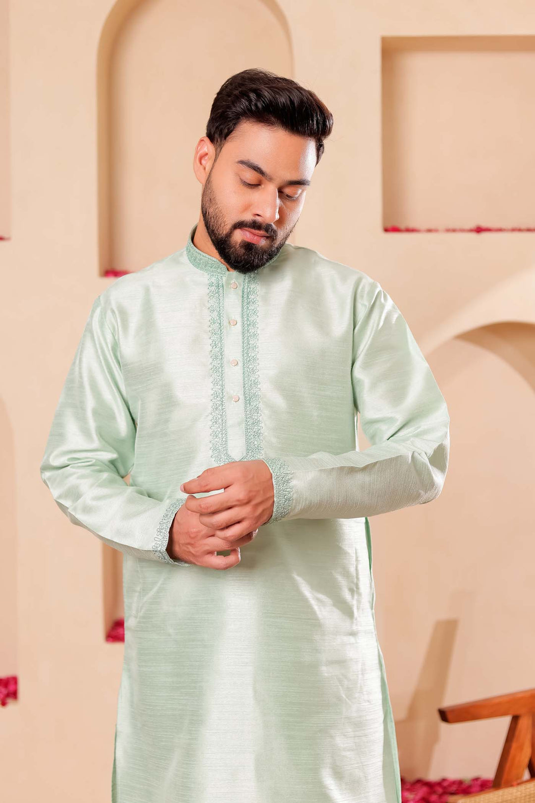Pista green Raw Silk Kurta Suit with Intricate work on neckline.