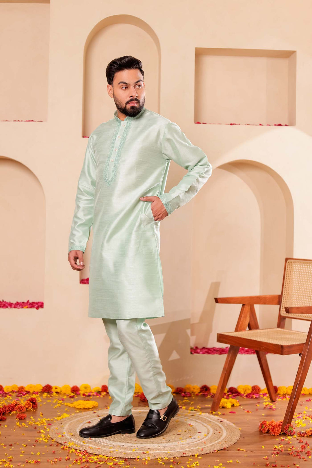 Pista green Raw Silk Kurta Suit with Intricate work on neckline.