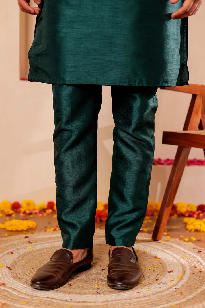 Bottle Green Raw Silk Kurta Suit with Intricate work on neckline.