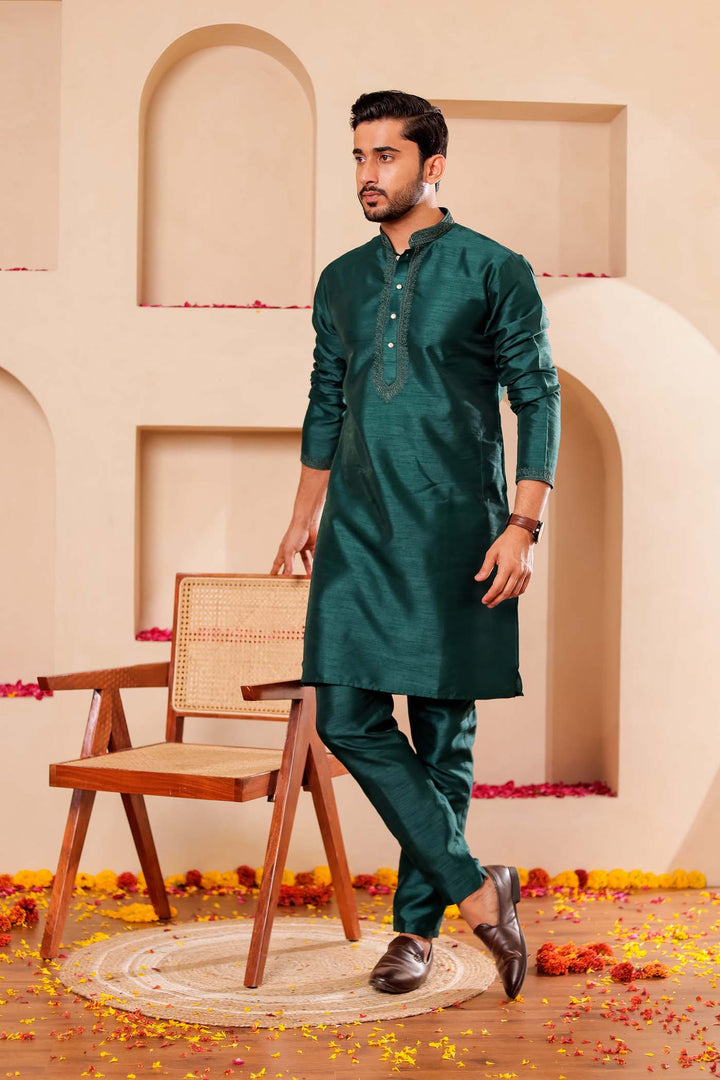 Bottle Green Raw Silk Kurta Suit with Intricate work on neckline.