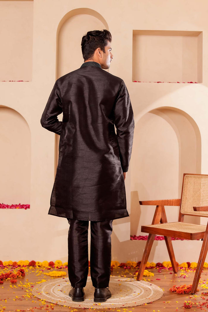 Black Raw Silk Kurta Suit with Intricate work on neckline.