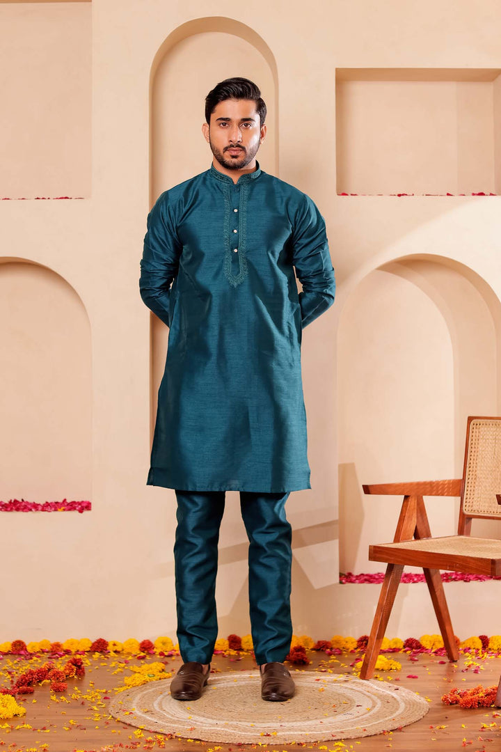 Teal Green Raw Silk Kurta Suit with Intricate work on neckline.