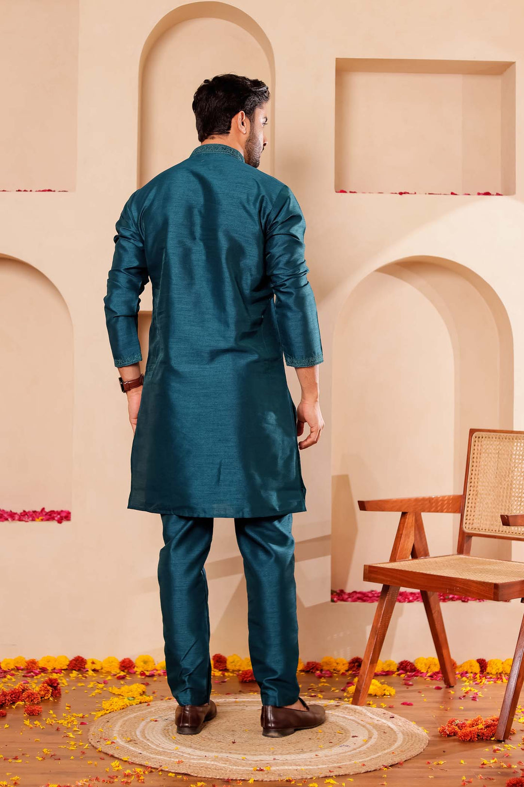 Teal Green Raw Silk Kurta Suit with Intricate work on neckline.