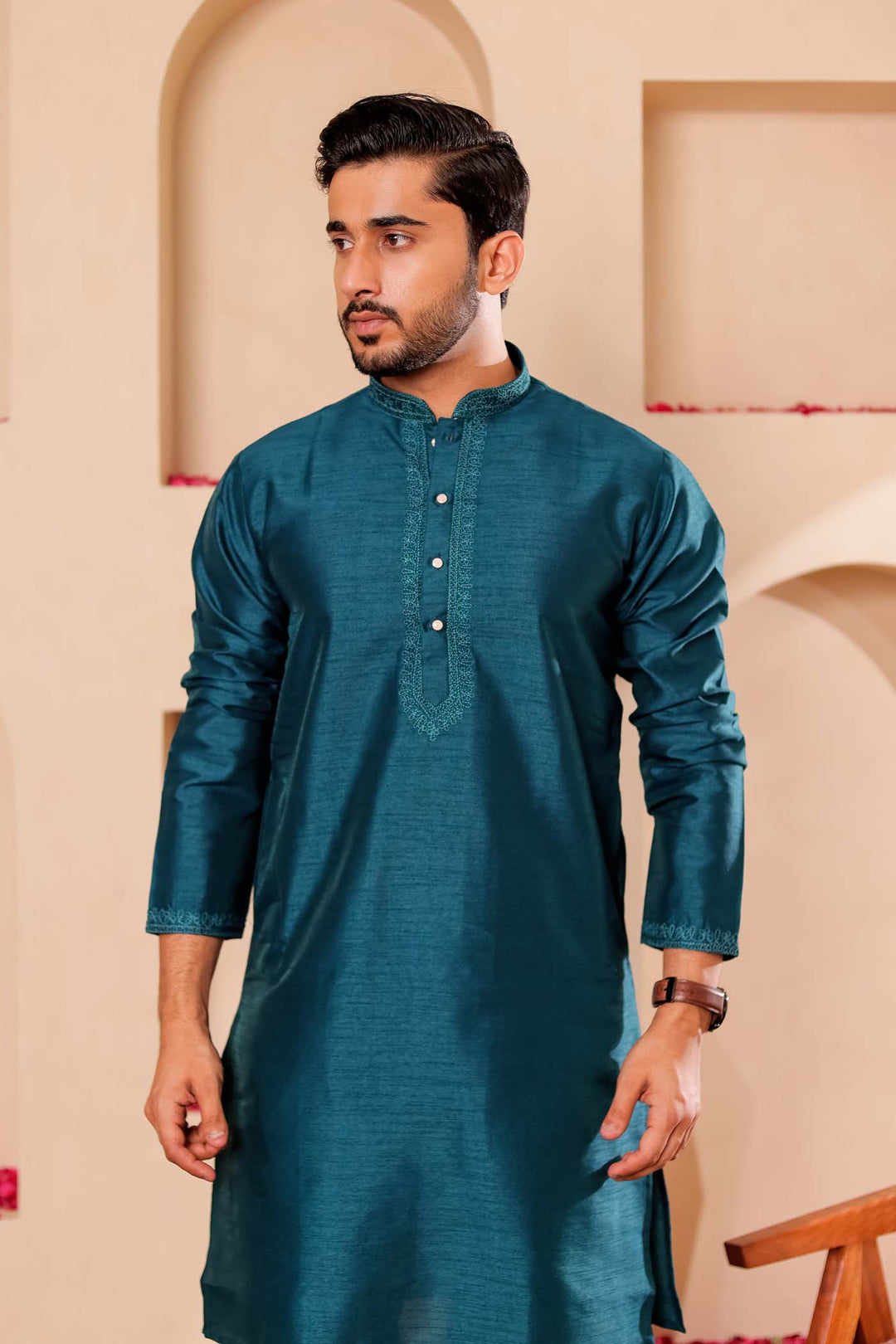 Teal Green Raw Silk Kurta Suit with Intricate work on neckline.