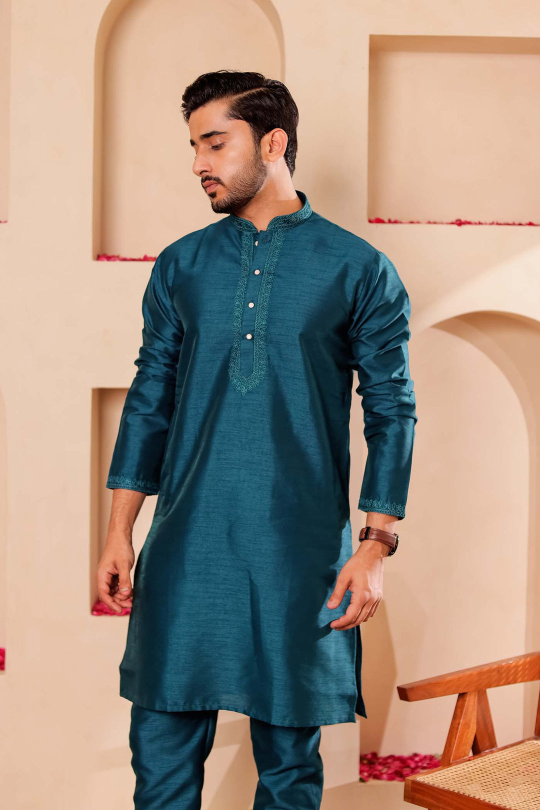Teal Green Raw Silk Kurta Suit with Intricate work on neckline.
