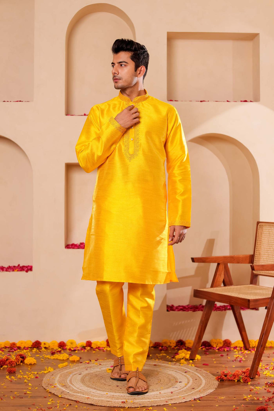 Yellow Raw Silk Kurta Suit with Intricate work on neckline.