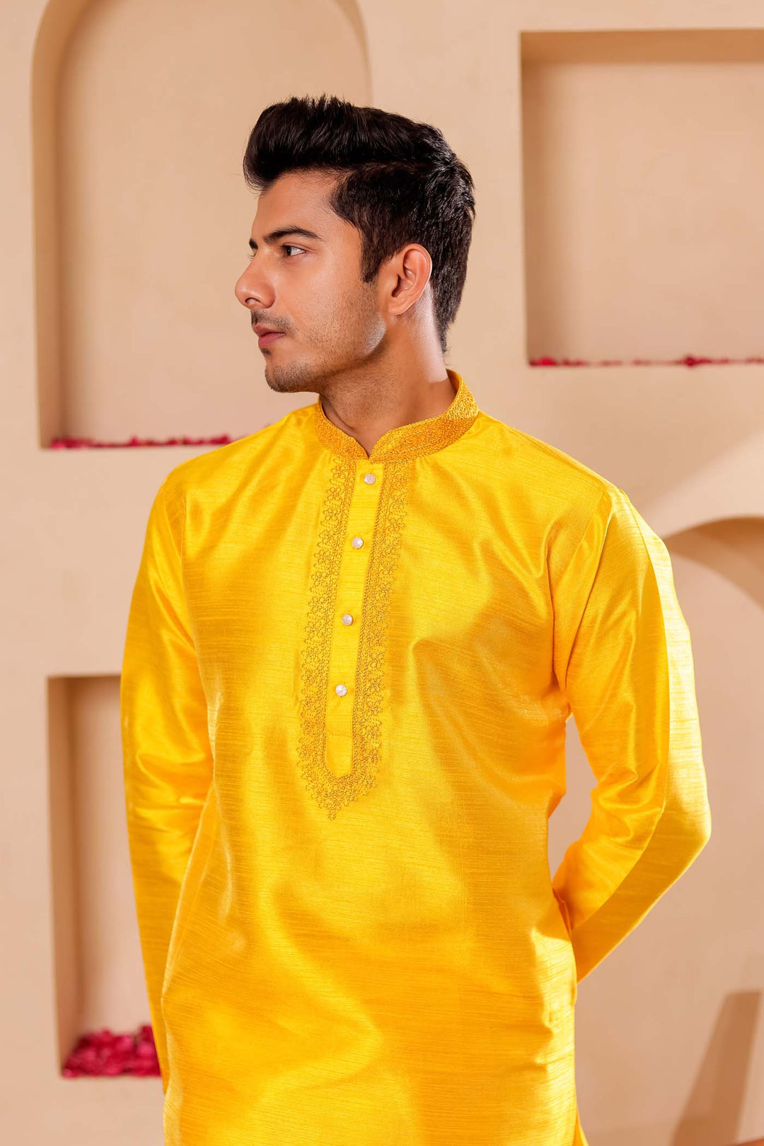 Yellow Raw Silk Kurta Suit with Intricate work on neckline.