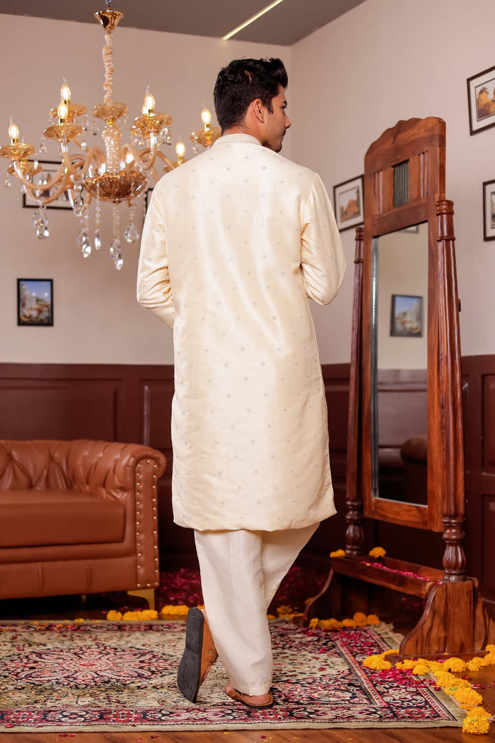 Cream Silk Kurta Suit with Thread Embroidery on Neckline.