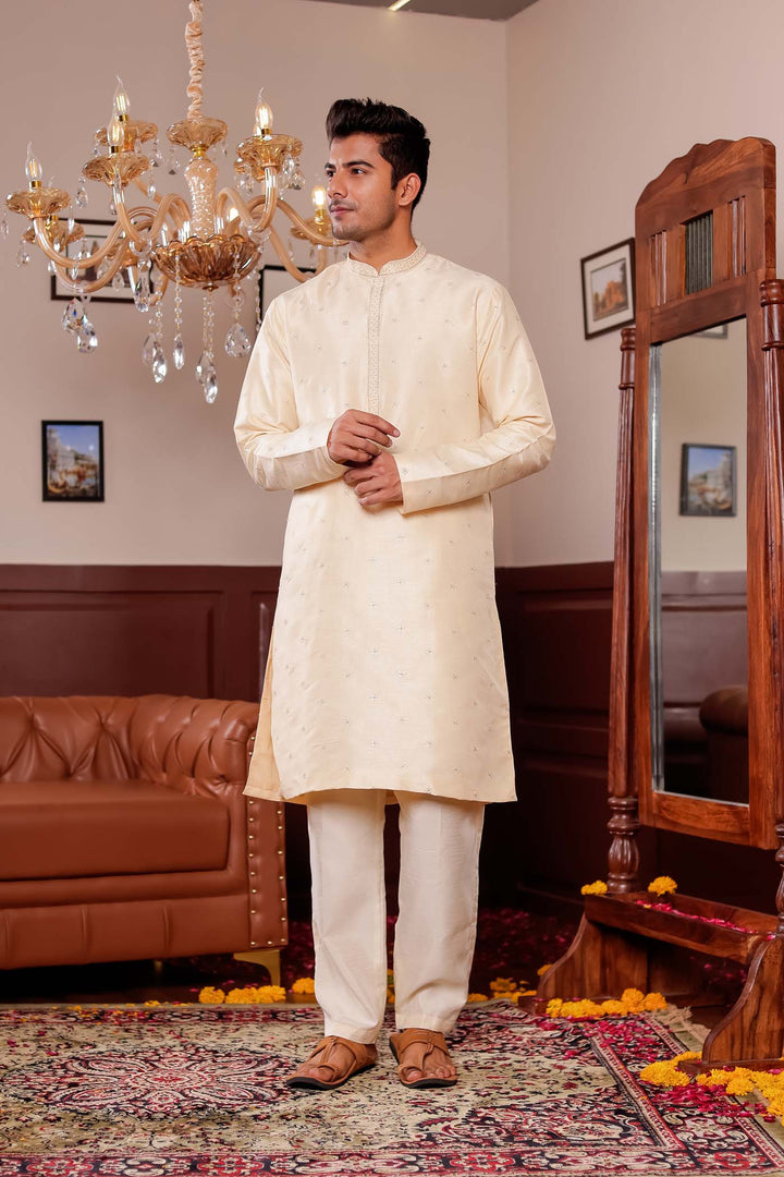 Cream Silk Kurta Suit with Thread Embroidery on Neckline.