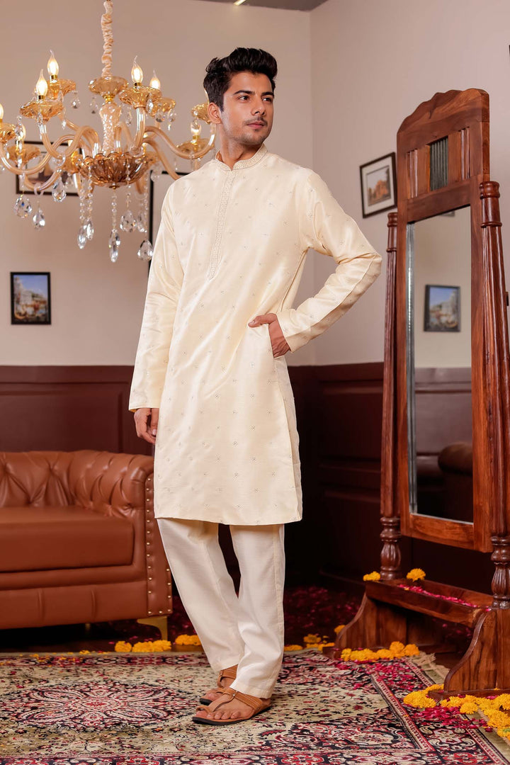 Cream Silk Kurta Suit with Thread Embroidery on Neckline.