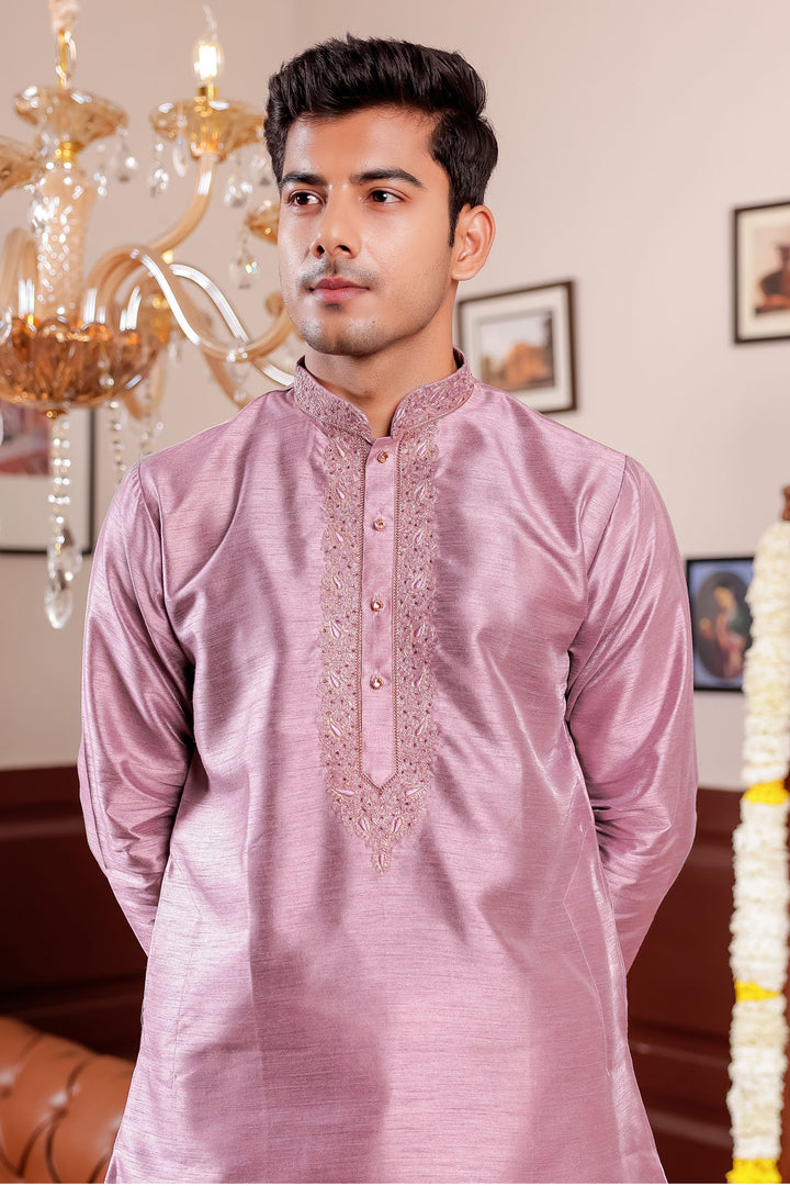 Mauve Raw Silk Kurta Suit with Intricate Embroidery.