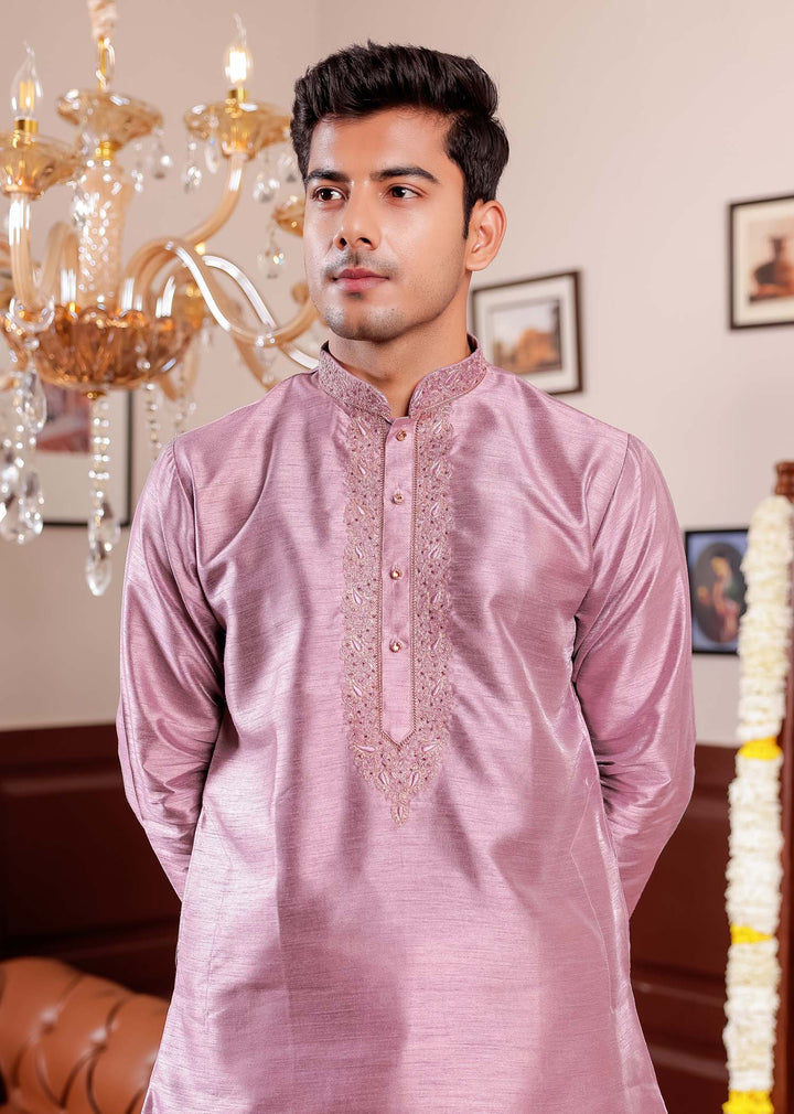 Mauve Raw Silk Kurta Suit with Intricate Embroidery.